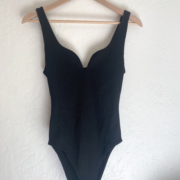 Zara Tops - Zara Black Ribbed bodysuit with snap closures - size small - RUNS SMALL